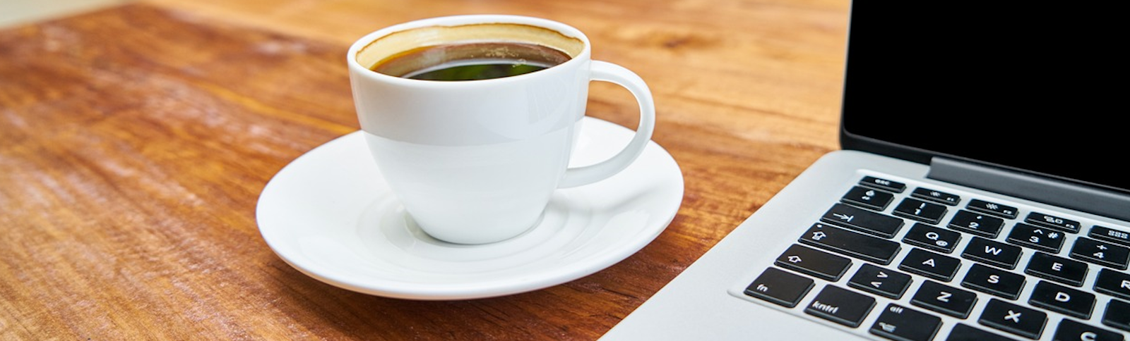 Laptop and Coffee Cup